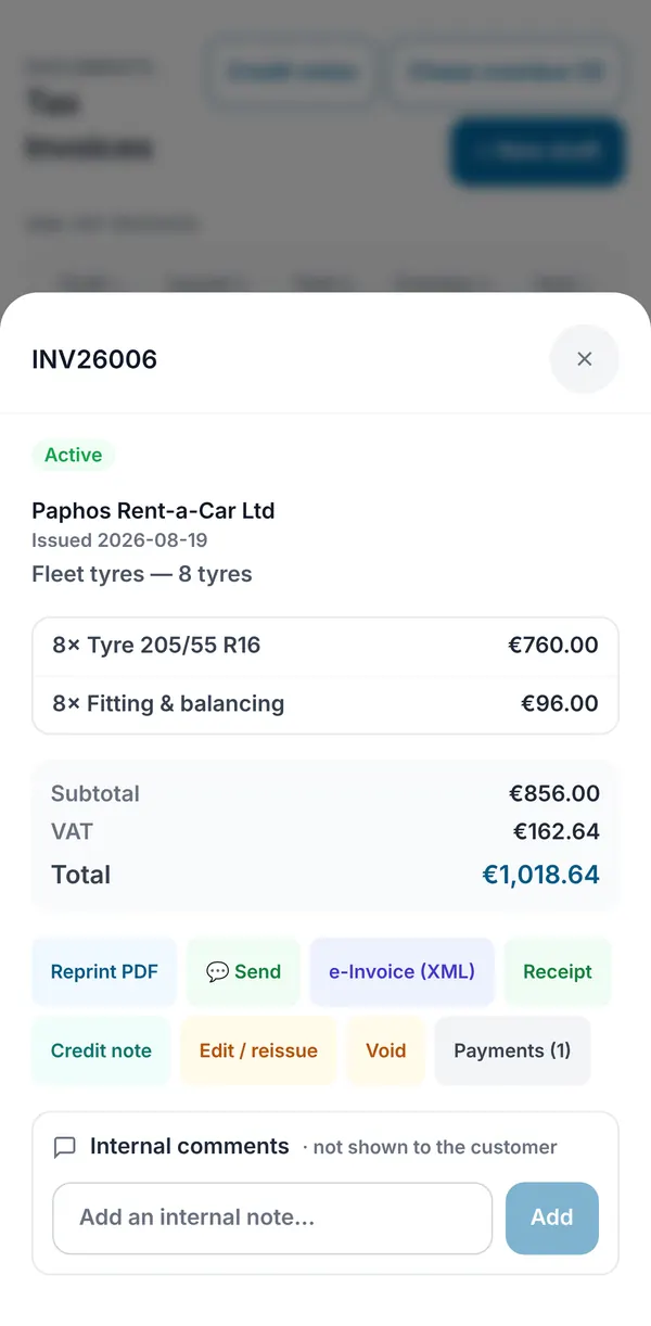 An issued invoice with its lines, subtotal, VAT and total, and buttons to reprint, send, export an e-invoice, take a receipt, credit, reissue or void.